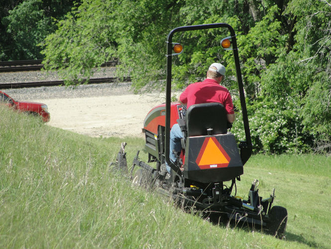 How to safely mow steep slopes